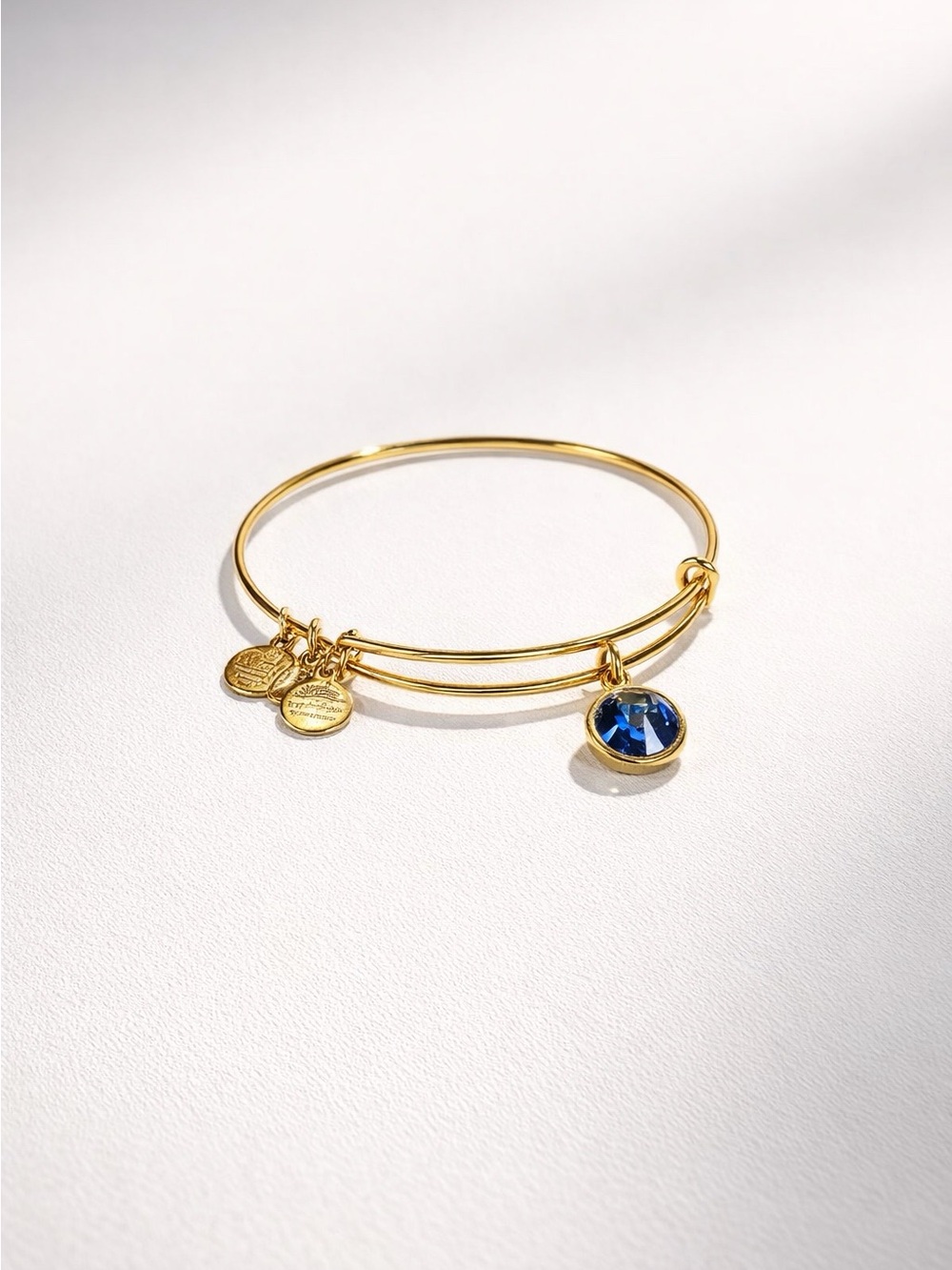 Alex and Ani Gold Bangle with Blue Crystal Disc Charm
